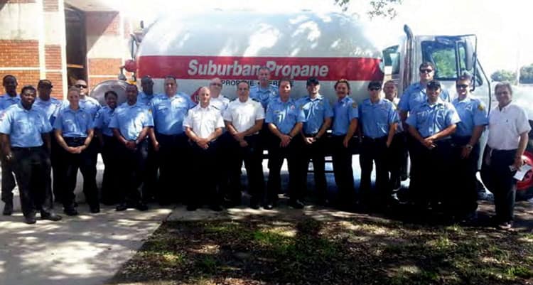 firefighters next to Suburban Propane truck