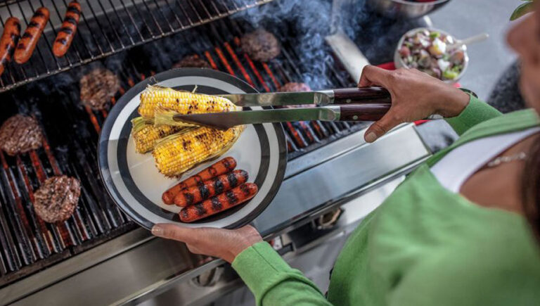 grilling meat and corn
