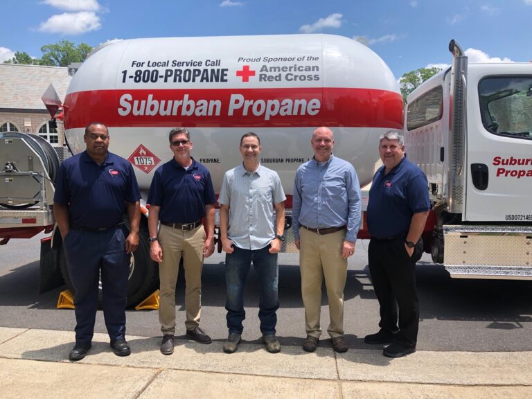 Suburban Propane team in front of bobtail truck