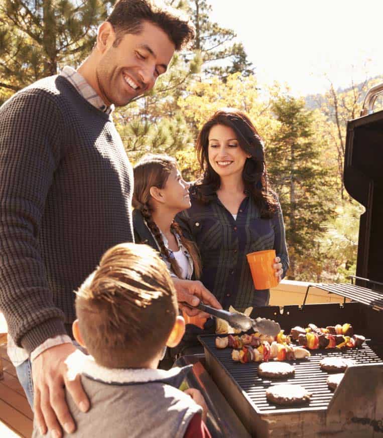 Family grilling together