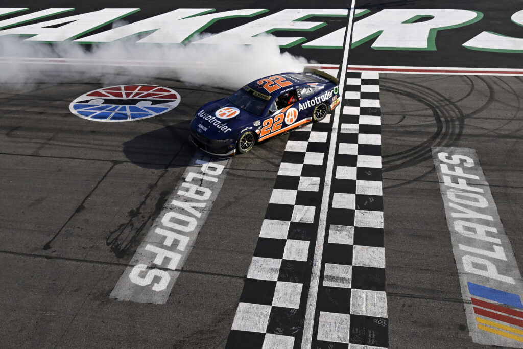 HAMPTON, GEORGIA - SEPTEMBER 08: Joey Logano, driver of the #22 Autotrader Ford, celebrates with a burnout after winning the NASCAR Cup Series Quaker State 400 Available at Walmart at Atlanta Motor Speedway on September 08, 2024 in Hampton, Georgia. (Photo by Logan Riely/Getty Images)